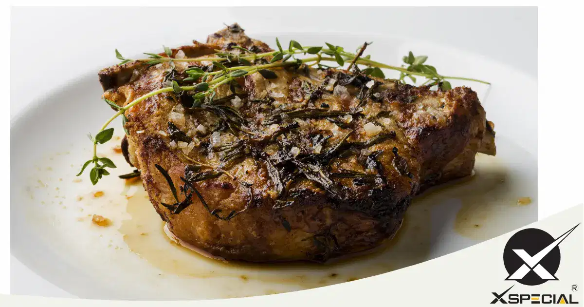A steak adorned with herbs, perfect for meat lovers.