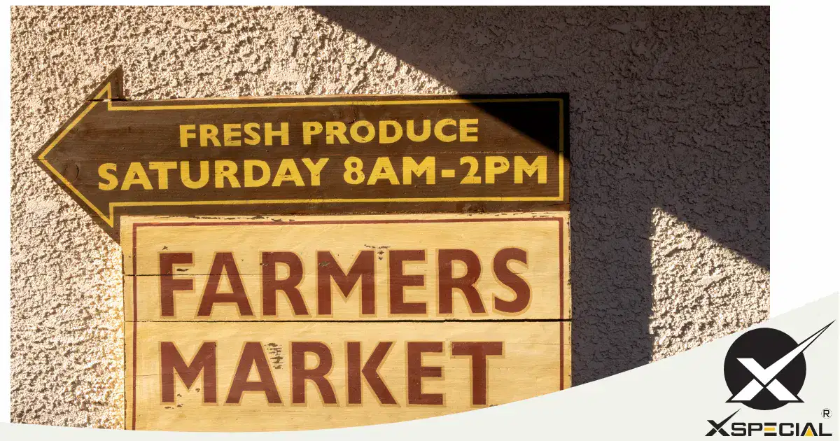 A sign advertising fresh produce for meat lovers and foodies, featuring Blade Meat Tenderizers.